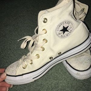 cream colored high top converse